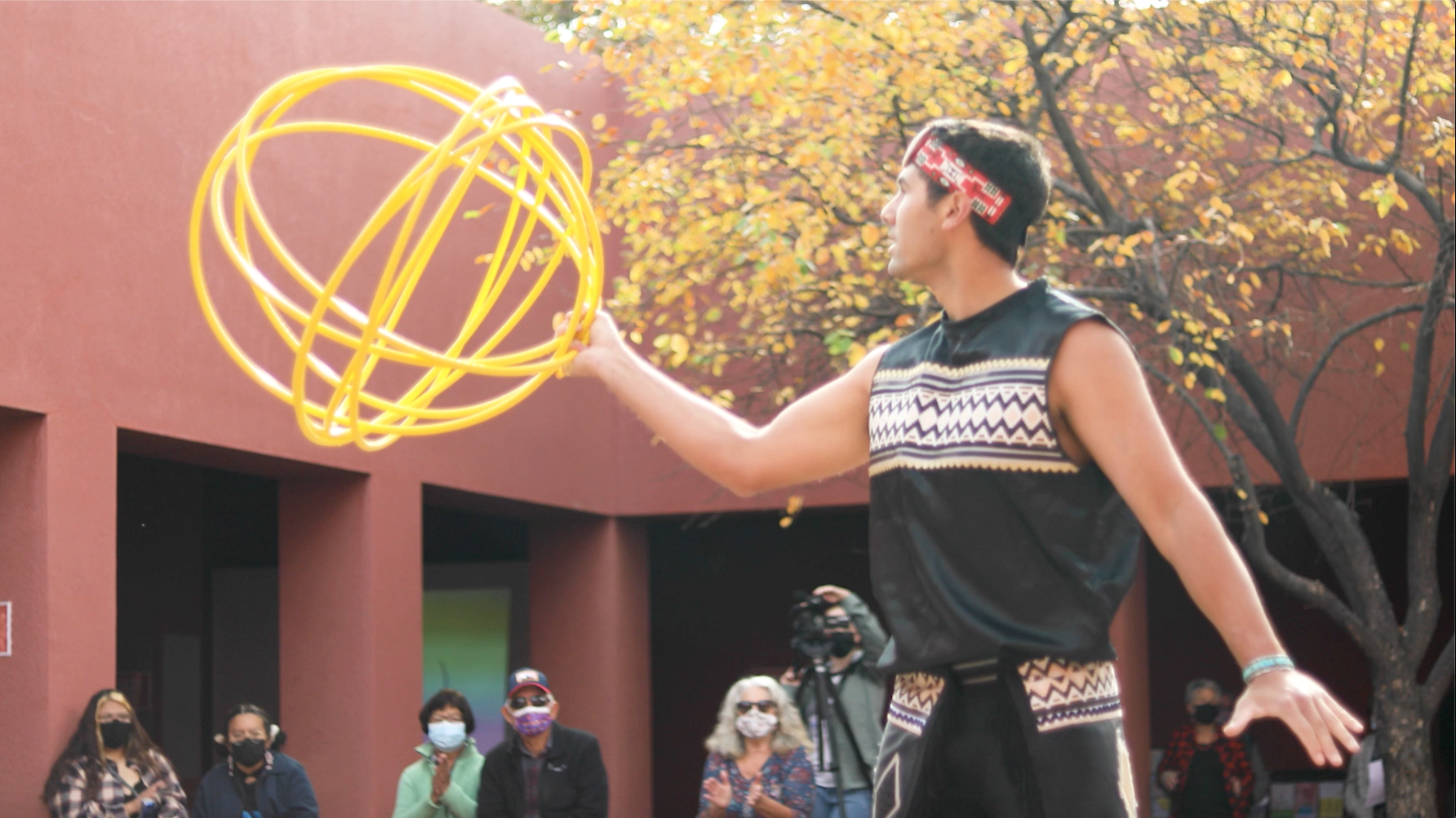 Screen Shot 2021-11-30 at 2.06.42 PM Man holding hoops